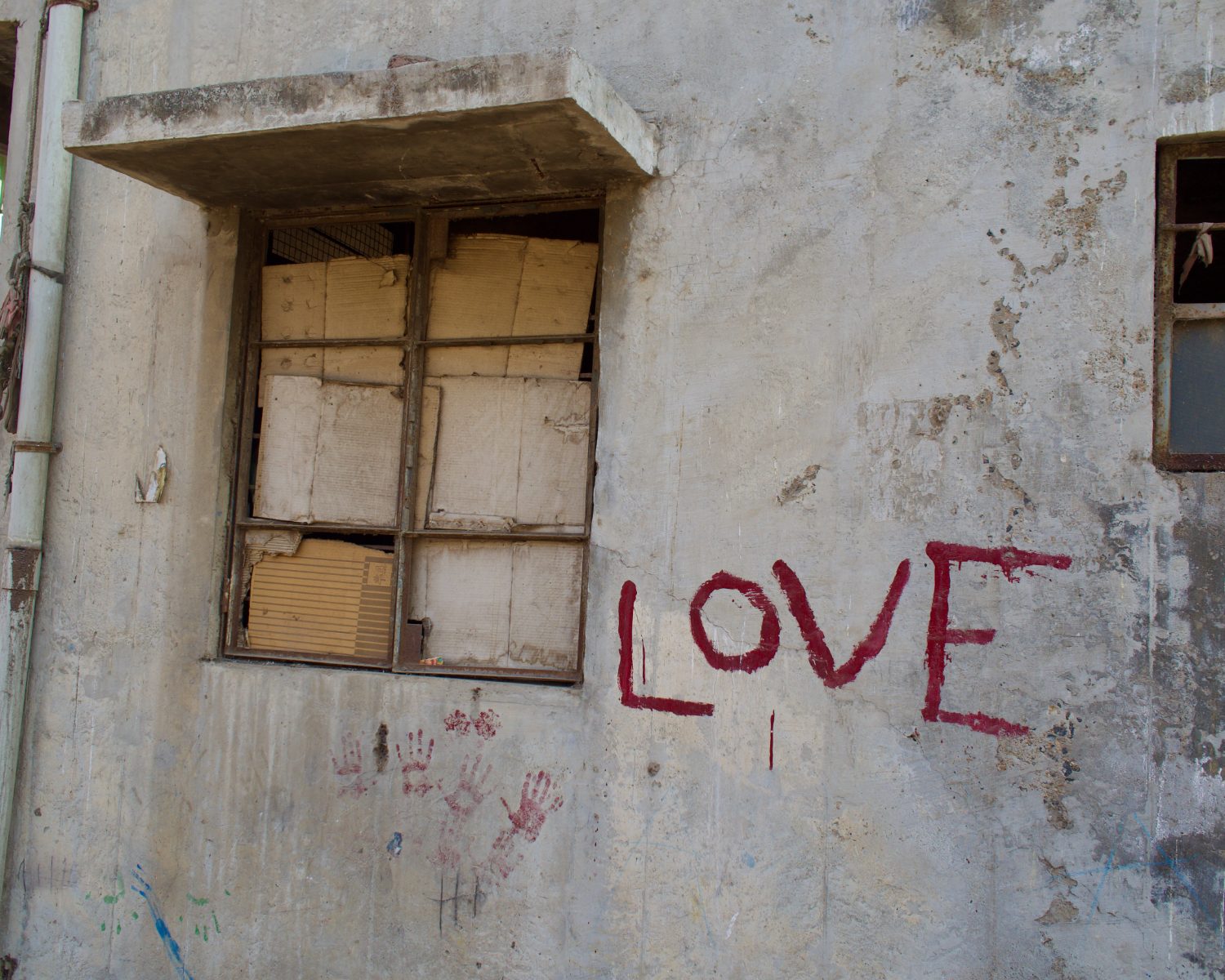 ‘Love’ painted on a concrete wall