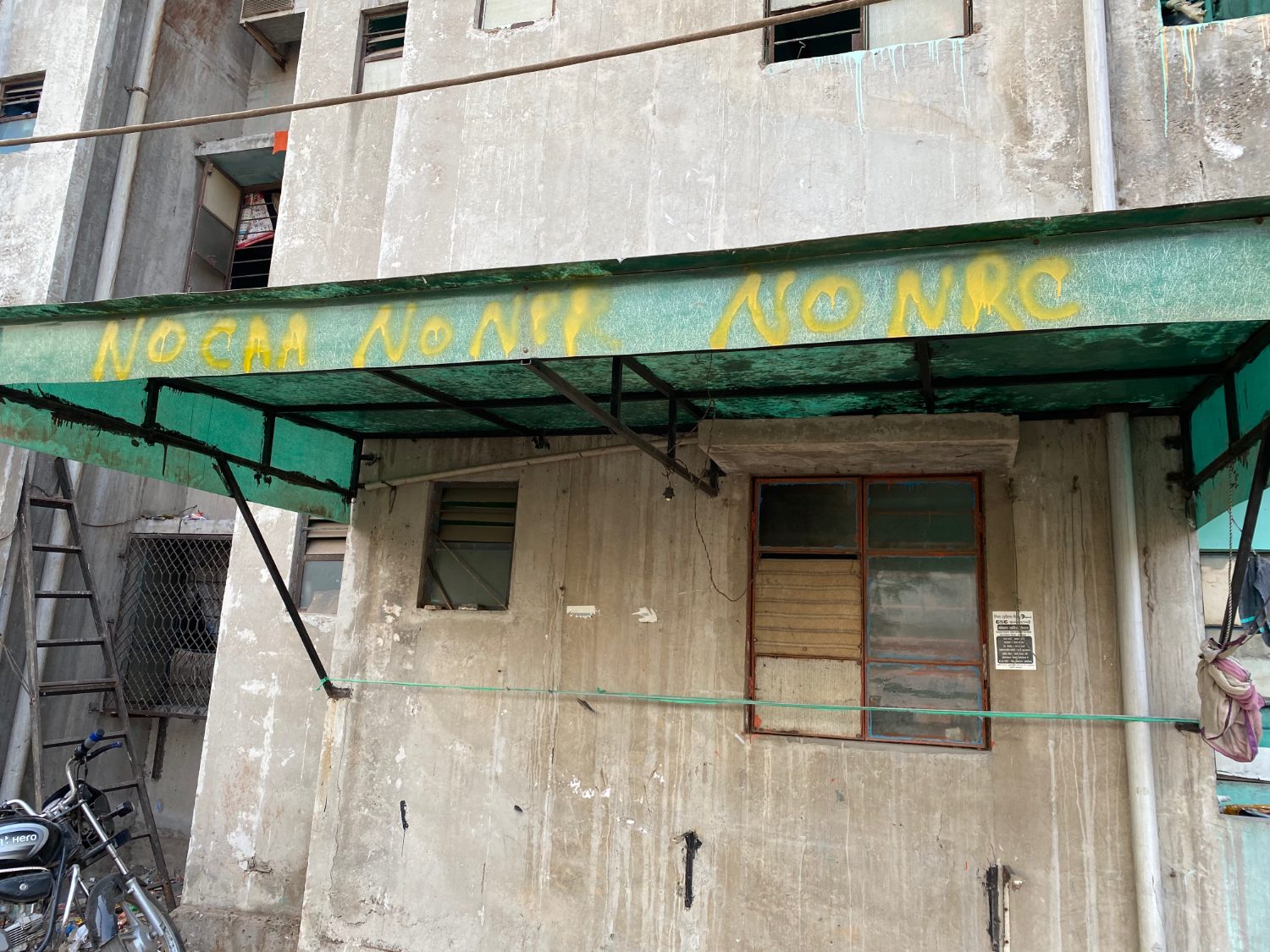 ‘No CAA, No NRC’ graffiti on an awning